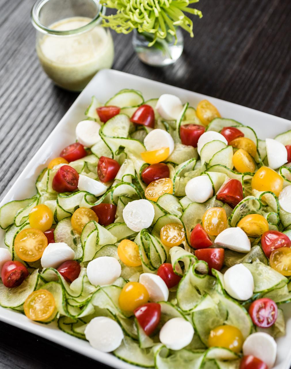 Cucumber Caprese Salad Serves: 8 2 medium seedless cucumbers 1 cup red cherry tomato halves 1 cup yellow cherry tomato halves 1 cup fresh mozzarella balls, halved Salt and coarse black pepper 1/3 cup
