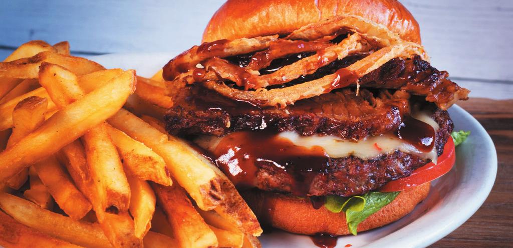 SANDWICH STACK THE SHED BURGER* 12.49 A half-pound Certified Angus Beef burger topped with our in-house smoked beef brisket, Pepper Jack cheese, BBQ sauce and fried onion strings.