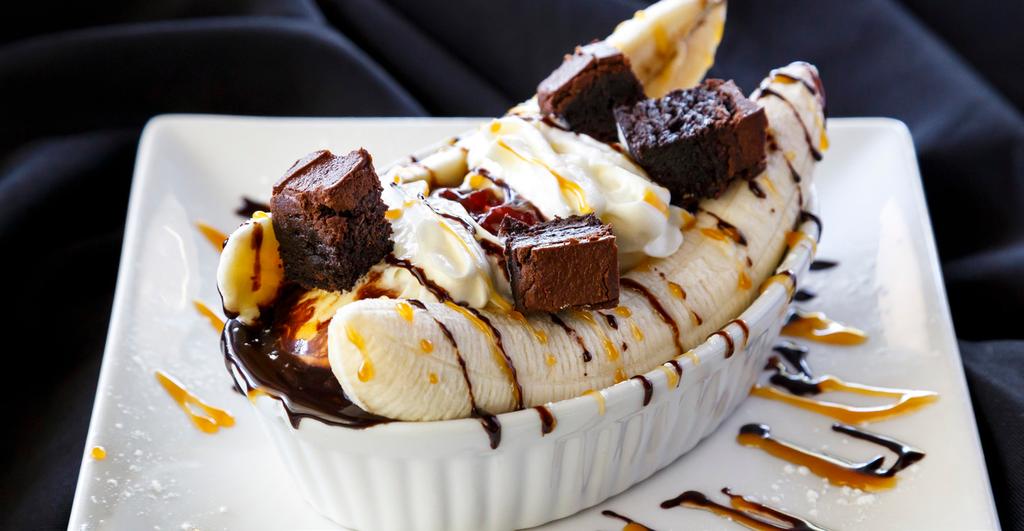 99 Chocolate Fudge Brownie Sundae Homemade Pecan Butter Tart Warm Fudge Brownie / Vanilla Ice Cream Whipped Cream / Chocolate &