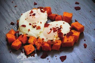 degrees F. Toss the sweet potatoes with the coconut oil, seasonings and some salt and pepper. Lay on a parchment lined baking sheet and roast for 20-25 minutes, until tender.