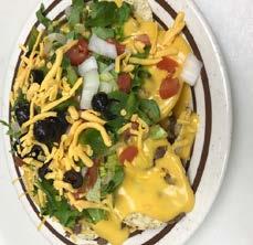 Appetizers, Soup & Sides Appetizers Nachos Supreme Nacho chips with melted cheddar cheese sauce.