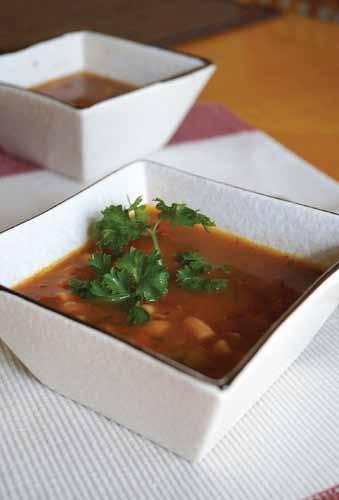 VEGETARIAN MINESTRONE.............................................................................................................. Vegetarian Minestrone PER SERVING: 06 calories 8g carbohydrates 7g protein g fat Heat the oil in a soup pot over medium heat and add the onion.