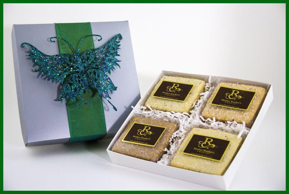 Sugar Gems Holiday Gift Box This shimmery silver box adorned with a sparkling butterfly ornament and matching ribbon is filled with one dozen of our individually wrapped Sugar Gems.