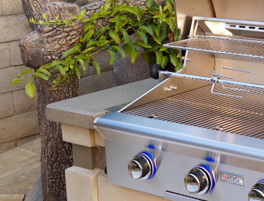L SERIES GRILLS The L series grills feature an electronic push button ignition system, interior halogen lights, and back-lit knobs (controlled by a push button