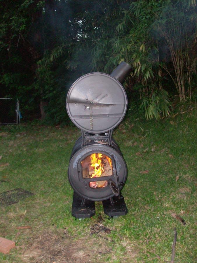 Here is the side with a fire burning: Smoke the bacon with hickory or walnut wood at 200 degrees until the internal temperature of the meat reaches 150.
