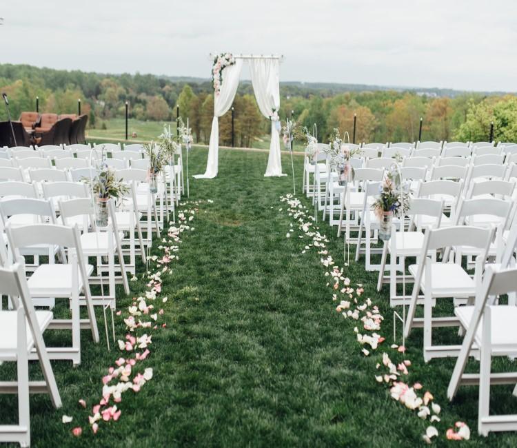 Package Prices Include Our Climate Controlled Tented Ballroom, Dance Floor and Chiavari Chairs For a Five Hour Reception White Floor-Length Linen Complimented with White or Champagne Overlays and