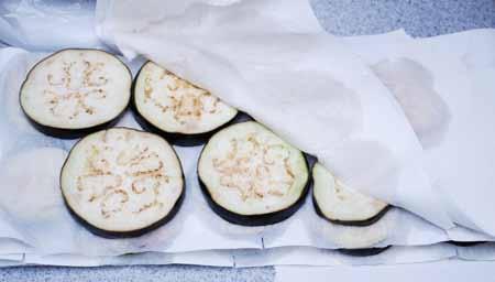 17 10 After the eggplant has sat for an hour, rinse the slices well in cold water to remove the salt.