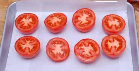 3 4 If using fresh tomatoes, cut them in half and arrange on a baking sheet.