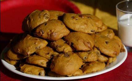 1 cup shortening 5 cups flour 3 cups sugar 1 bag chocolate chips (use the big milk chocolate ones for best results) 1 large can of pumpkin 2 eggs 1 tsp Vanilla 1 tsp baking powder 1 tsp baking soda 1