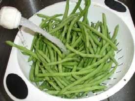 I'm sure you can figure out how to rinse the green beans in plain cold or lukewarm water.