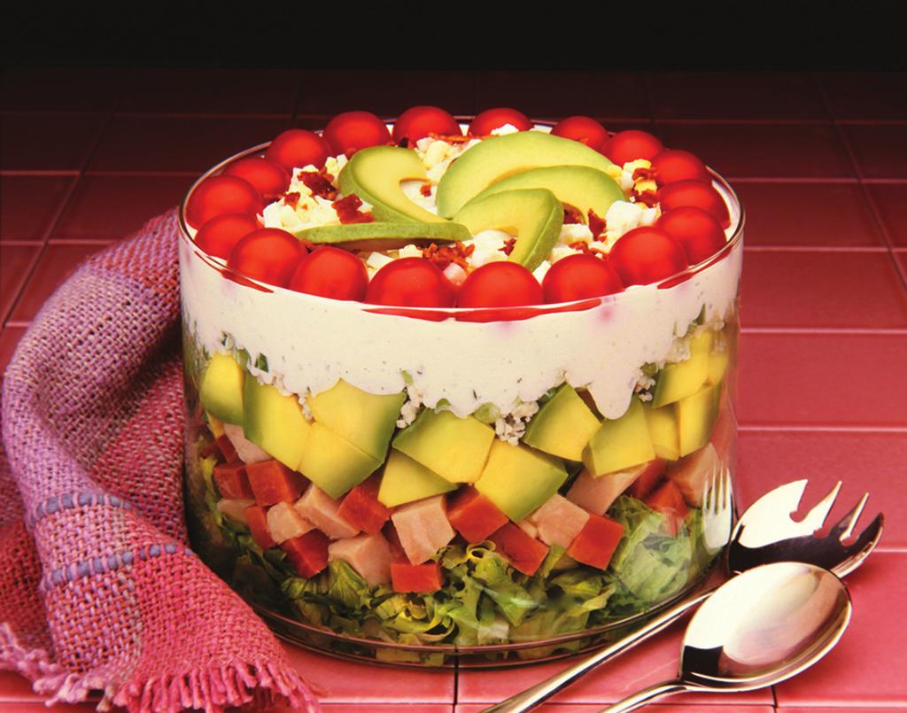 Classic Seven Layer Salad Vintage California Avocado Recipe: California avocados have been part of summer picnics and get-togethers for generations.