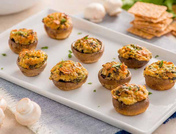 White Cheddar Stuffed Mushrooms ½ cup Crunchmaster Multi-Grain White Cheddar Crackers, crushed ¼ cup grated Pecorino Romano cheese 2 oz.