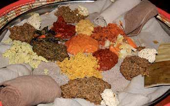 Ethiopian injera, accompanied by traditional spicy condiments Italian pesto and its ingredients Middle East Many of the best-known spices and herbs had their origins in the Middle East, which is