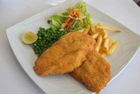 Cordon Bleu - Pork Fillet filled with Ham & Cheese served with Chips & Peas 390 231 Slow roasted Chicken Breast - with