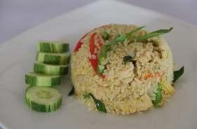 SPECIALTY FRIED RICE The Specialty Fried Rice is unique to Ark Bar Kaow Pad Keaw Whan - Fried Rice with Green Curry,