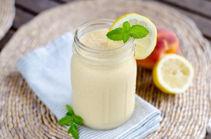 PEACH COCONUT SMOOTHIE 1 cup full fat coconut milk, chilled 1 cup ice 2 large fresh peaches, peeled and cut into chunks fresh lemon zest, to taste 2 servings 1.