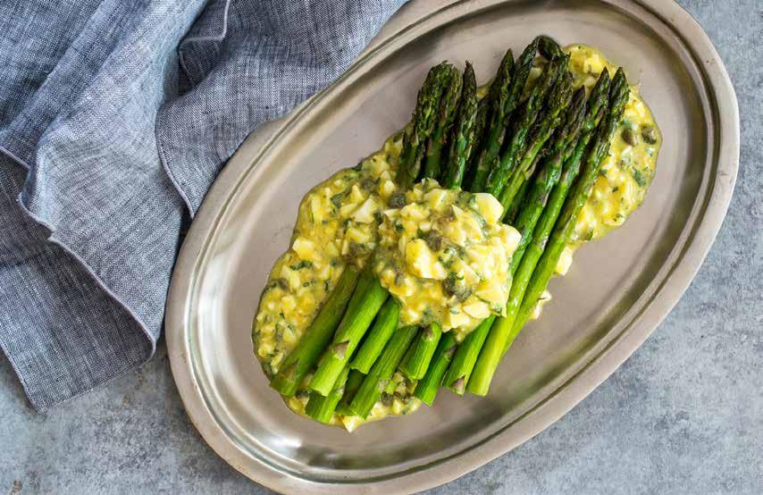 SIDES AND SALADS 22 Asparagus with Gribiche Sauce 2 hard boiled eggs 1 large garlic clove, finely minced 2 teaspoons dijon mustard 1 tablespoon white wine vinegar 1/3 cup extra virgin olive oil 1