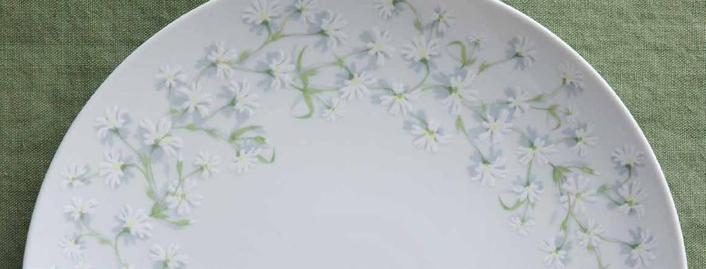 STELLARIA page 34 Raised white flowers with yellow starbursts and forest-green foliage form the centrepiece of Stellaria, a stunning range of durable porcelain tableware and gifts.