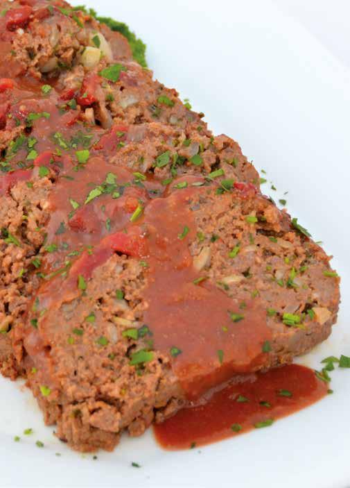 Mama s Meatloaf 2 pounds (900 g) mixed ground pork, ground veal and ground beef 1 medium onion, diced 1 small clove of garlic, minced 2 egg yolks, lightly beaten ½ cup (120 ml) tomato ketchup 1
