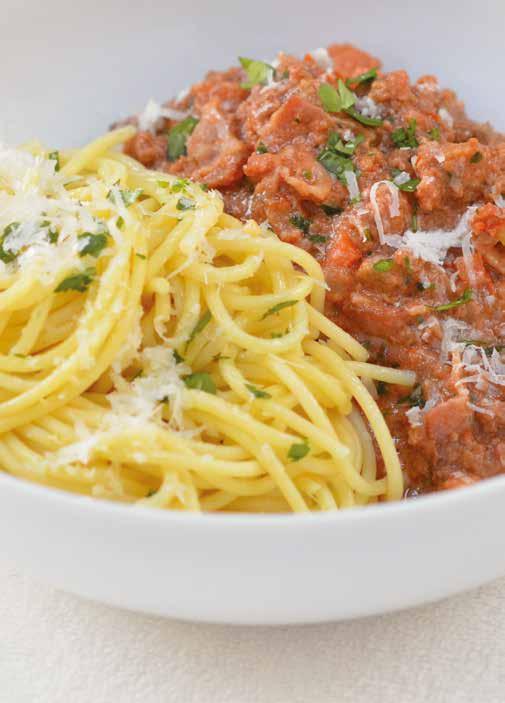 Rustic Bolognese Sauce 2 tablespoons olive oil ¼ pound (113 g) bacon, cut into ½-inch (1 cm) slices ½ medium onion, finely chopped 2 medium carrots, finely chopped 2 ribs celery, finely chopped 1