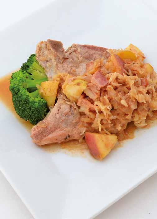 Pork Chops with Sauerkraut 2 tablespoons olive oil 1 medium onion, chopped 3 slices bacon, chopped 4 bone-in pork chops 1 pound (450 g) sauerkraut, rinsed and drained 8 small red potatoes, halved or