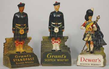 5ins wide, plastic, raised letters to both sides, WATNEYS barrel, crazing all over, R$40 (50-75) 6. KING GEORGE IV 8ins tall, plastic, KING GEORGE IV OLD SCOTCH WHISKY, R$50 (60-90) 7.