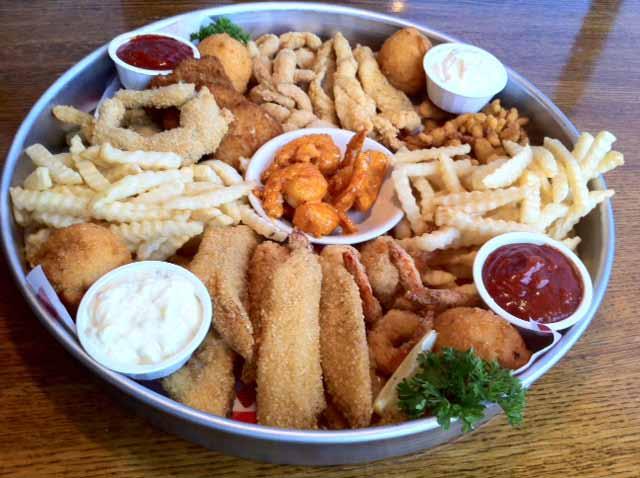 Served with two sides and hot hush puppies Catfish Strips Chicken