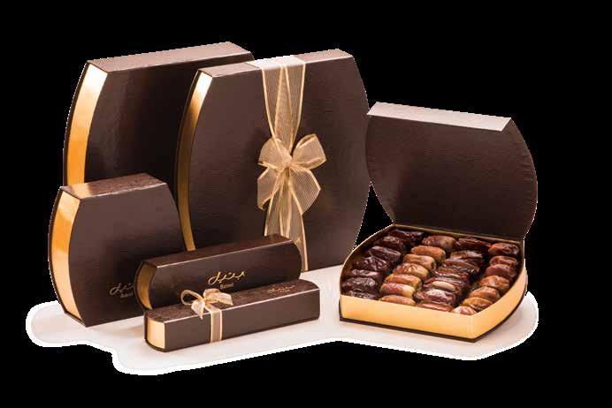 BARREL COLLECTION Barrel shaped boxes with a rich, dark brown leatherette finish 8-PIECE RECTANGLE SMALL MEDIUM