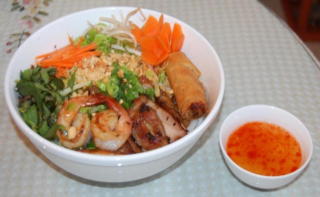 Vermicelli - Bu n Noodles served with seasoned fish sauce; contains rice vermicelli, sliced lettuce, shredded carrot/daikon, bean-sprout, grounded-peanut, topped with crispy-fried white onion,