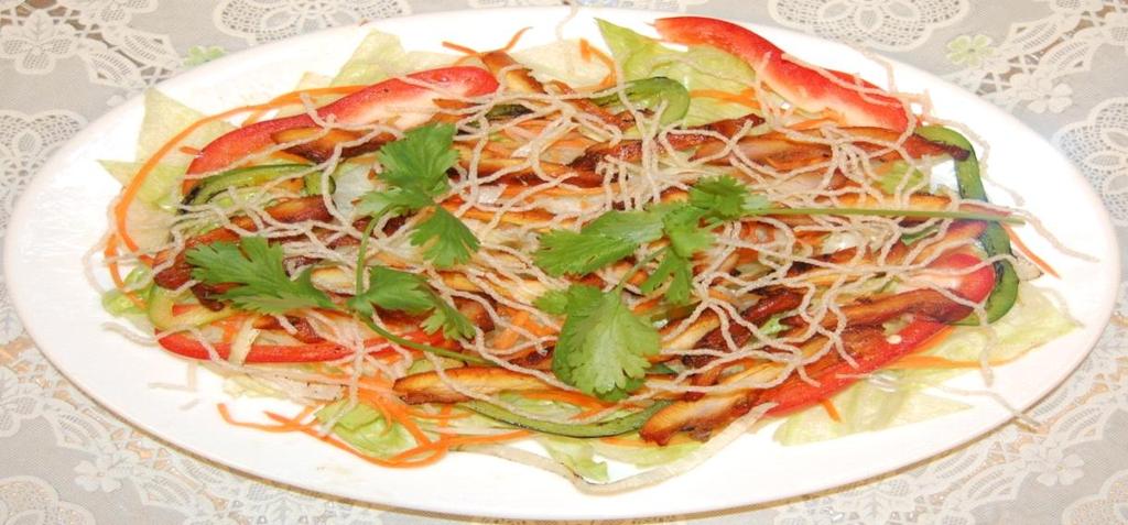 Salad Grilled Chicken Salad - Go i Ga Nươ ng, contains lettuce tossed with our Viet's home-made salad dressing,