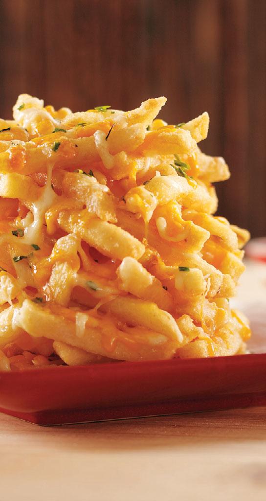 PULL-APART CHEESE FRIES Recipe Yield: 1 serving (20 oz.) Skin-on 5/16" Phantom Sharp cheddar cheese, wide shred Mozzarella cheese, wide shred Chives, finely chopped Ranch dressing, prepared 20 oz.