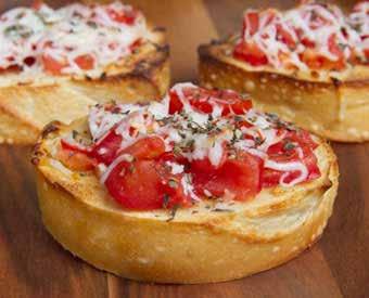 BRUSCHETTA Bread: 1 baguette, sliced into ¾-inch thick rounds 2 garlic cloves 2 Tbsp B.R. Cohn California Extra Virgin Olive Oil 2 Tbsp finely shredded fresh parmesan Topping: 10 ripe Roma or Campari