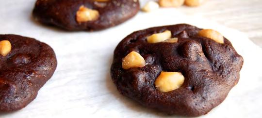 Dark Chocolate Macadamia Nut Cookies These cookies have a delicious blend of sweet chocolate and salty, nutty flavors. Macadamia nuts are speckled throughout the light, fluffy dark chocolate cookies.