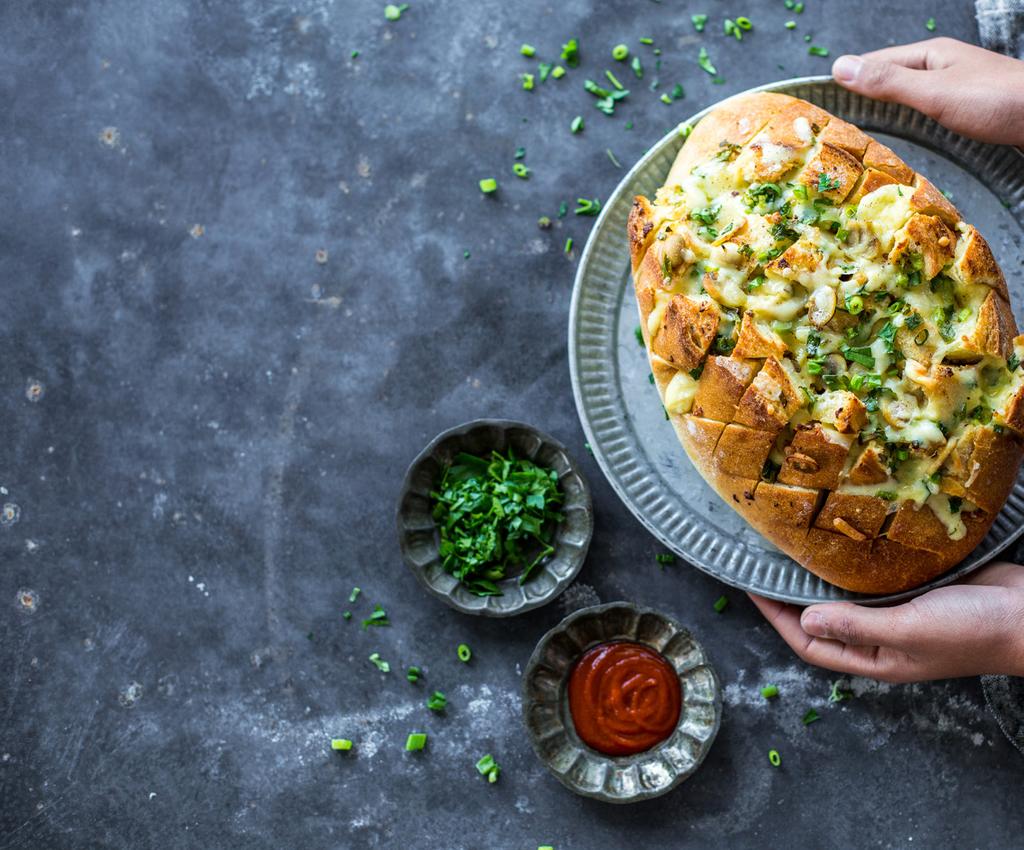 Sneh Roy @cookrepublic Cheesy mushroom garlic pull apart bread Serves 6 100G SALTED BUTTER 1/3CUP (60G) WHITE BUTTON MUSHROOM, THINLY SLICED 5 SMALL GARLIC CLOVES, MINCED 1 BAKERS DELIGHT AUTHENTIC