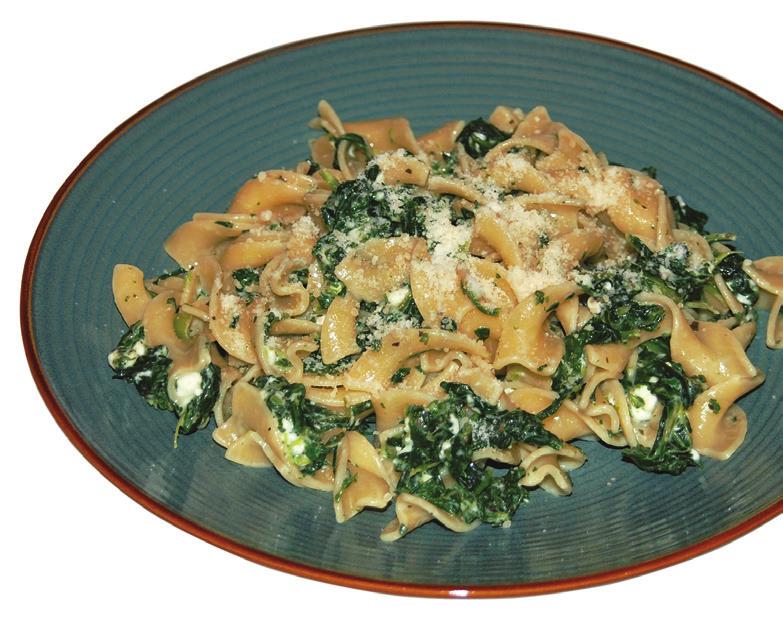CHEESE SPINACH NOODLES Makes 6 servings Prep Time: 20 minutes Cook Time: 15 minutes 8 ounces whole-wheat egg noodles 10 ounce package frozen chopped spinach, thawed and drained 1/2 teaspoon dried
