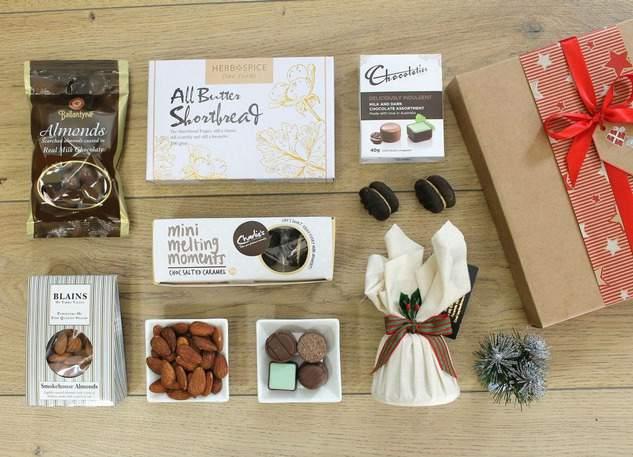 Festive moments $55 Charlie's Cookies Choc Salted Caramel Mini Melting Moments 50g Baylie's Epicurean Delights Traditional Christmas Pudding 100g Chocolatier Deliciously Indulgent Assorted Chocolates