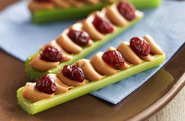 Ladybugs on a Log! Raisins can be a healthy snack for your kids! Try this recipe below with them.