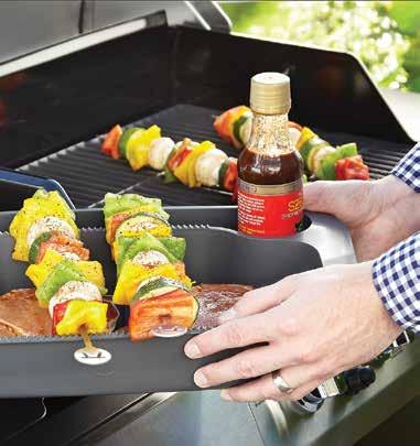 a breeze Designed for one-handed carrying from kitchen to grill Side compartment holds everything you need
