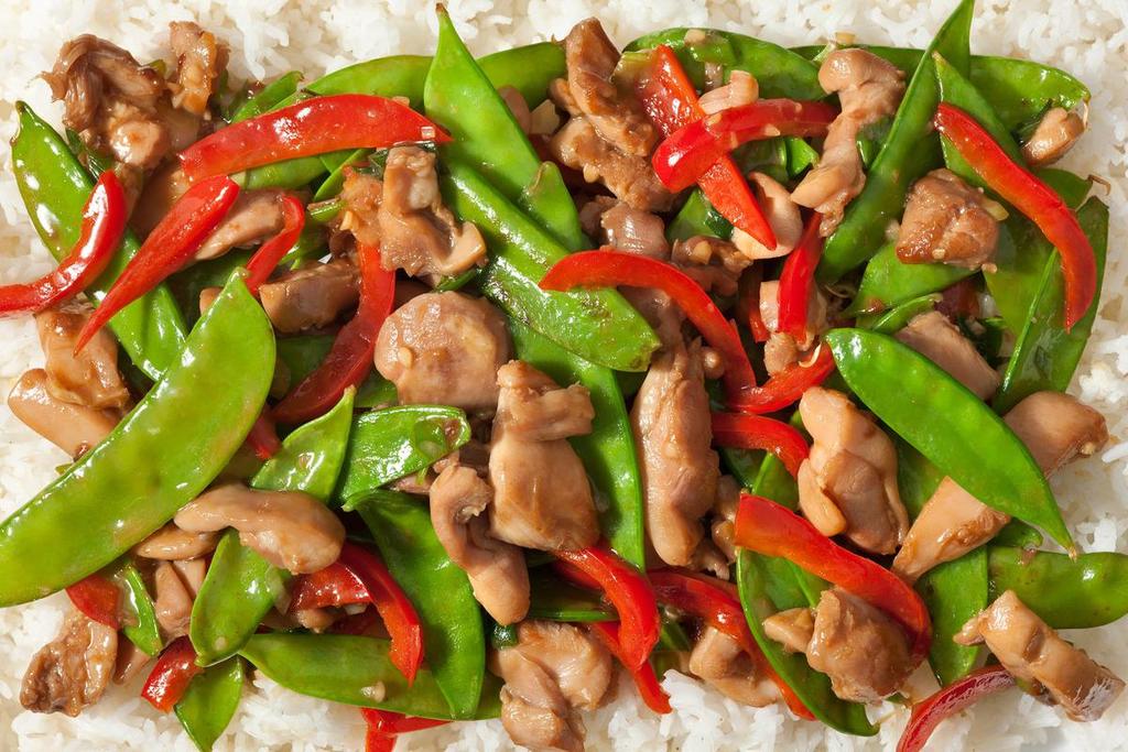CHICKEN VEGGIE STIR-FRY 6oz cooked skinless chicken breast ½ cup cooked brown rice ½ cup snap peas ½ cup broccoli Bragg s Amino Acid Soy Sauce Alternative 1 tsp Garlic Powder 1 tsp Onion Powder Red