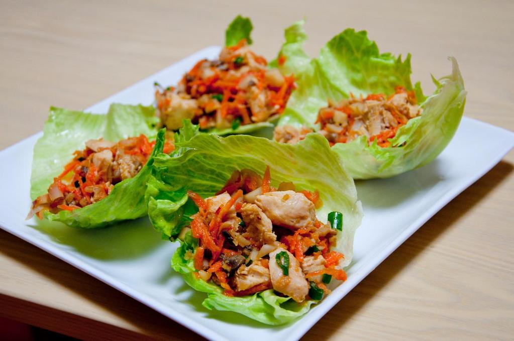 CHICKEN TACOS 6oz cooked skinless chicken breast 1/2 cup black refried beans ¼ cup chopped green onion ½ cup pico de gallo 4 pieces romaine lettuce ¼ tsp red pepper flakes Heat beans in a sauce pan