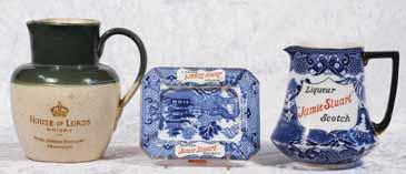5ins tall jug, willow pattern, red and black words in shield, LIQUEUR JAMIE STUART SCOTCH, J & G Stewart Ltd, light wear to gold rim, Very R$175 (200-300) 151.