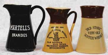 75ins tall, stoneware jug, raised shield with words, ROYAL TOBY WHISKY, to one side, TOBY MATURED GIN, to other side, raised shield with trade mark to front, & blue word MARSHALL S, inside rim of