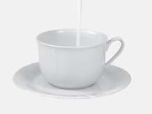 Froth the milk by gently swirling the cup.
