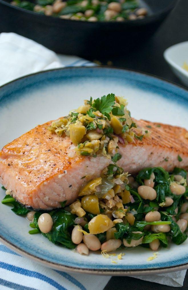Seared Salmon & Olives Seared salmon is paired with mellow white beans and garlicky spinach in this quick, healthy recipe. Top it with a flavorful olive relish.
