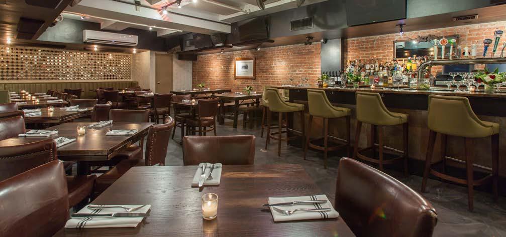 room outfitted with comfortable leather banquette booths, exposed brick wall and bar with polished concrete floors can accommodate groups of up to