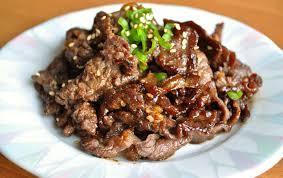 Korean Beef (Bulgogi) 1 lb flank or strip steak, thinly sliced 1/3 cup soy sauce 2 ½ tbs brown sugar 1/4 cup chopped green onion 2 tbs