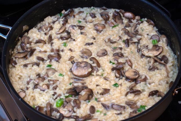 Mushroom Risotto 6 cups chicken broth, divided 3 tablespoons olive oil, divided 1/2 pound portobello mushrooms, thinly sliced 1/2 pound white mushrooms, thinly sliced 2 shallots, diced 1 1/2 cups