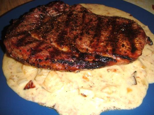 Onion Blue Cheese Sauce for Steak 2 whole Ribeye Steaks (or other grilling steaks) Salt Pepper 4 Tablespoons Butter 1 Large Yellow Onion,