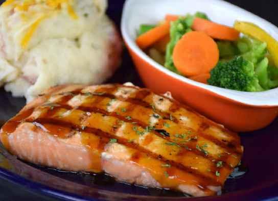 Salmon filet, char grilled and basted with bourbon glaze $16.95 1/2 Portion $9.50 1/2 Rack of Ribs Slow-smoked porked ribs falling off the bone, topped with your choice of BBQ sauce $14.