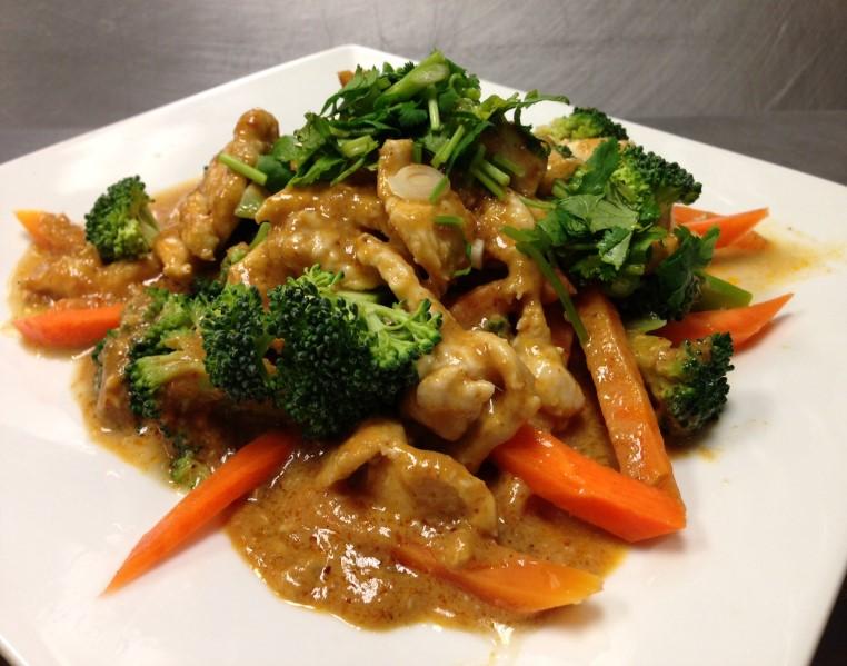 carrots and top w/ cilantro) tables stir fry with house sauce & garlic w/ chose of
